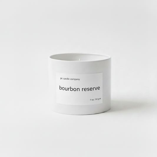 White candle tin with bourbon reserve label