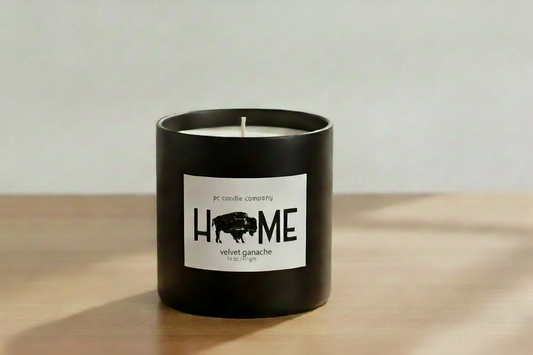Black jar candle with vanilla cold brew label