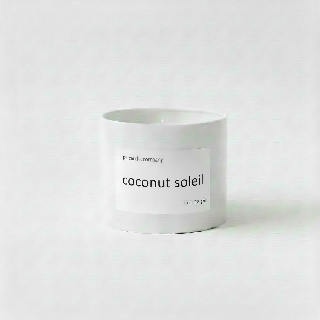White candle tin with coconut soleil label