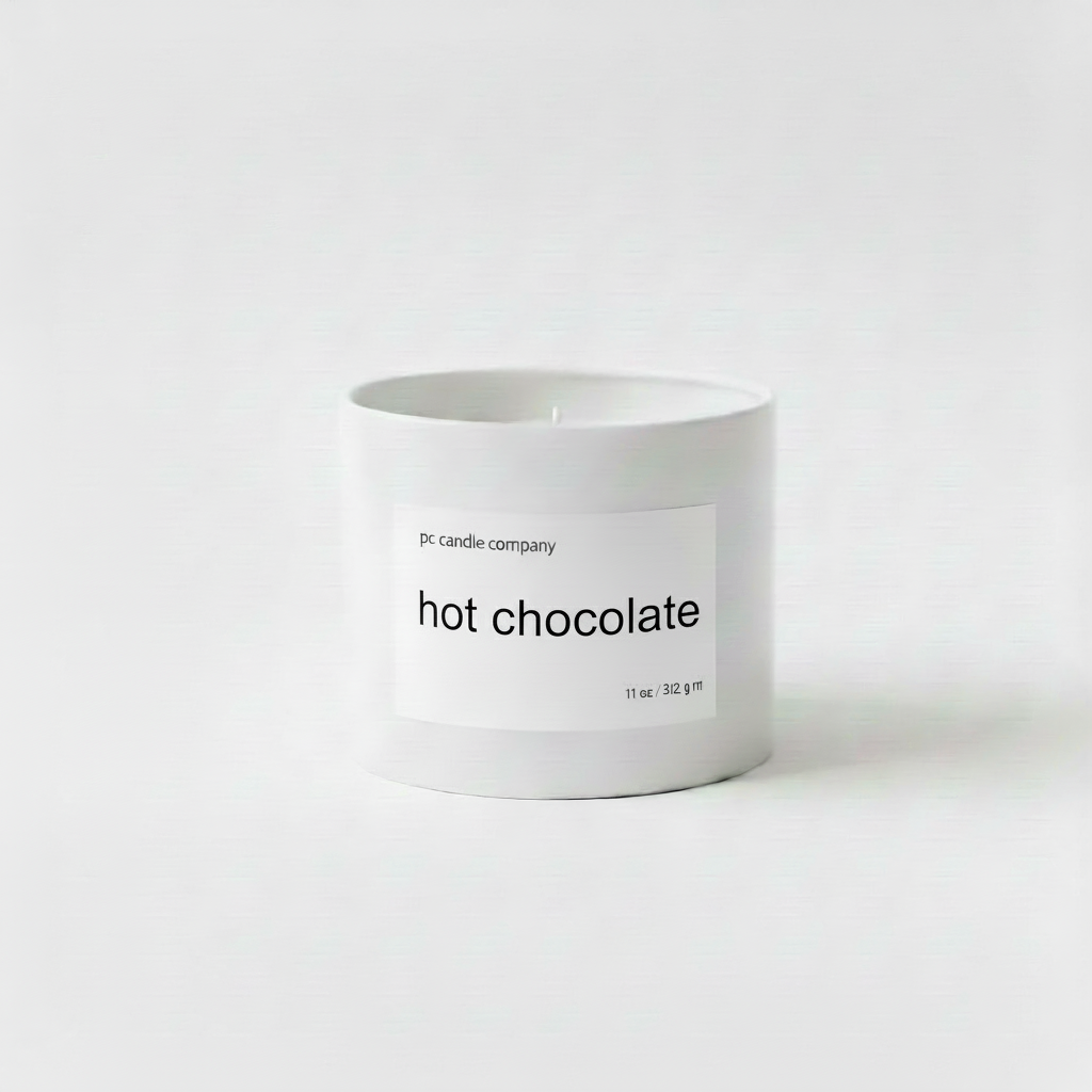 White candle tin with hot chocolate label