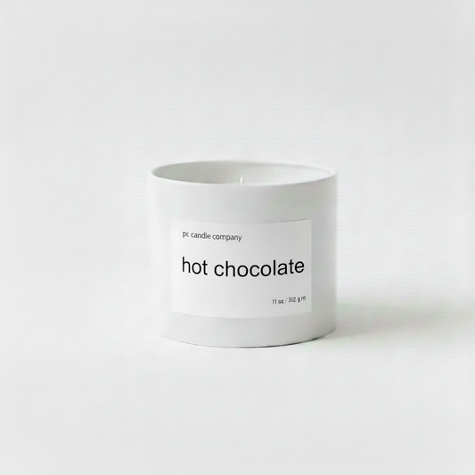 White candle tin with hot chocolate label