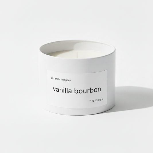 White candle tin with vanilla bourbon label